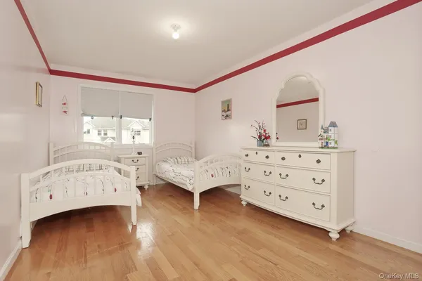 a bedroom with furniture and windows