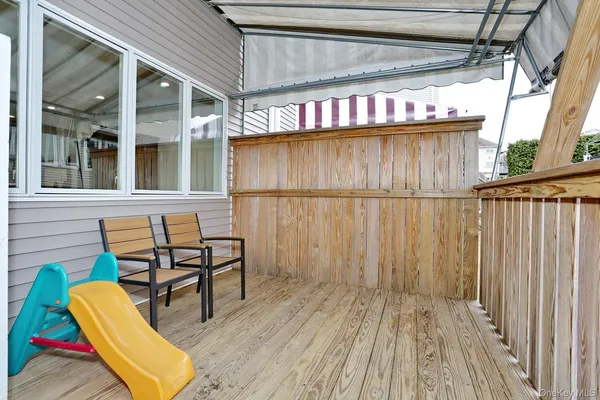 a view of a chairs on the roof deck