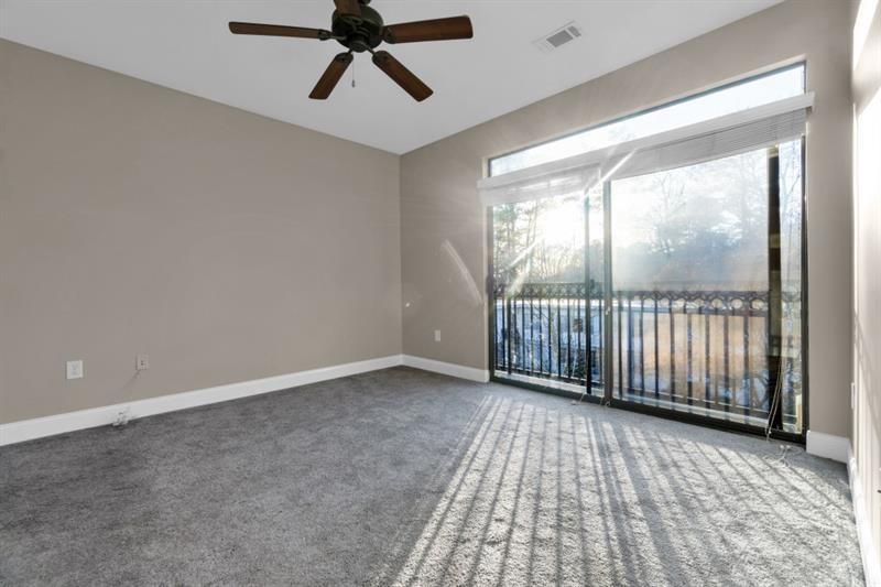 2230 Cheshire Bridge Road Northeast, Unit 412 Atlanta, GA 30324 - Photo 11 of 35 a view of an empty room and window