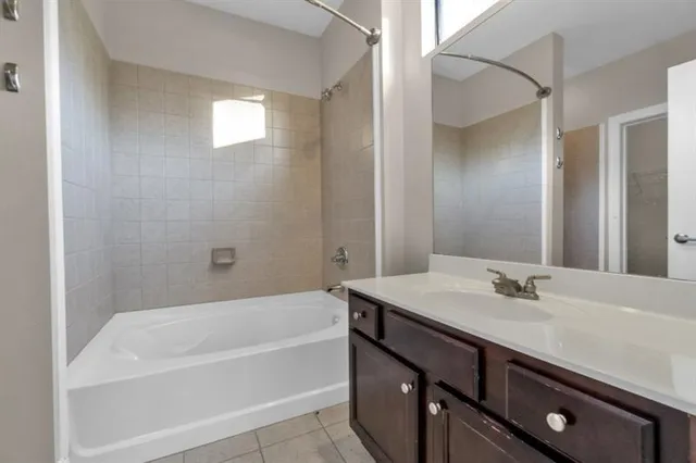 a bathroom with a sink and a bathtub