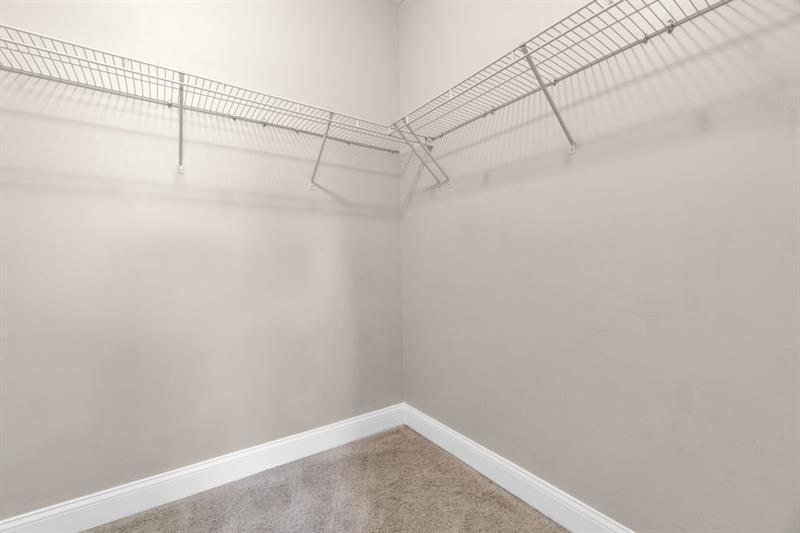 2230 Cheshire Bridge Road Northeast, Unit 412 Atlanta, GA 30324 - Photo 16 of 35 a view of a room with racks on the wall