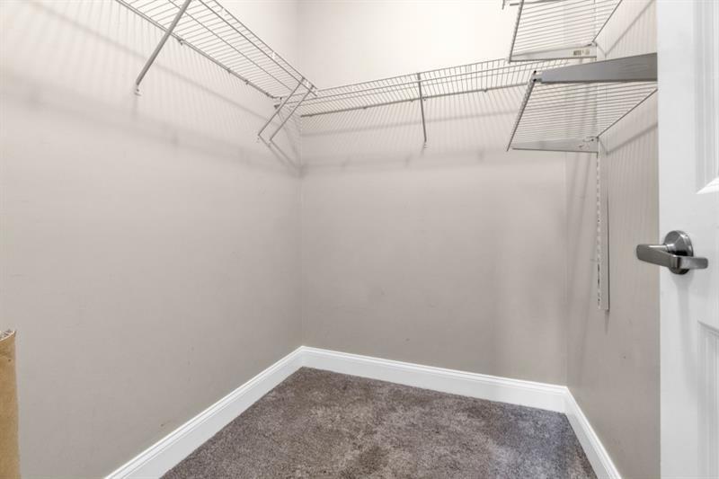 2230 Cheshire Bridge Road Northeast, Unit 412 Atlanta, GA 30324 - Photo 21 of 35 a view of a room with racks on the wall