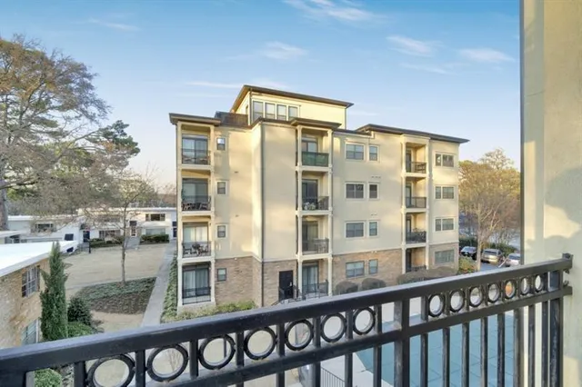 a front view of a building with glass windows
