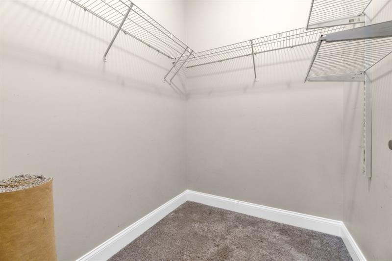 2230 Cheshire Bridge Road Northeast, Unit 412 Atlanta, GA 30324 - Photo 27 of 35 a view of a room with racks on the wall