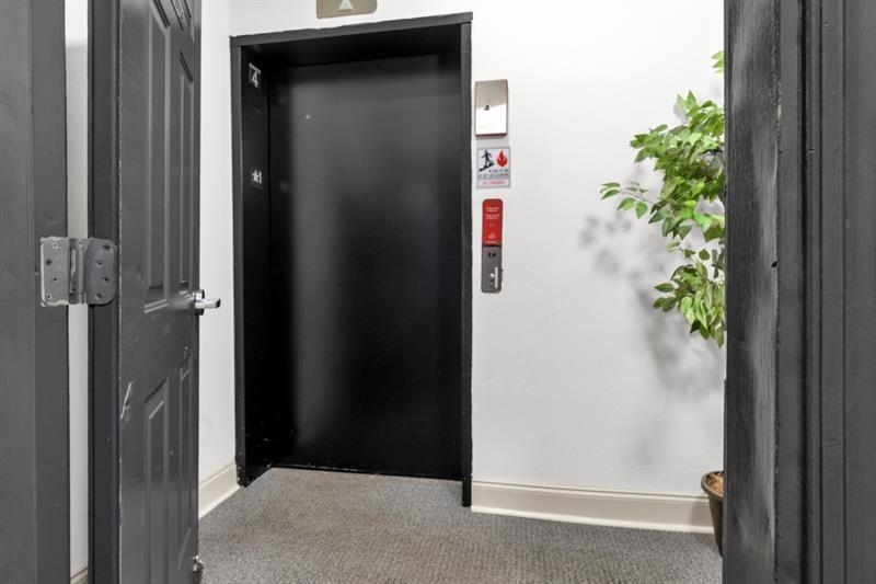 2230 Cheshire Bridge Road Northeast, Unit 412 Atlanta, GA 30324 - Photo 31 of 35 a view of a wooden door