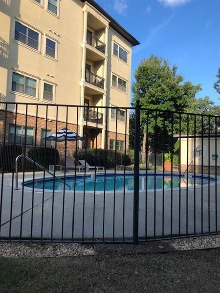 2230 Cheshire Bridge Road Northeast, Unit 412 Atlanta, GA 30324 - Photo 34 of 35 a view of a brick building