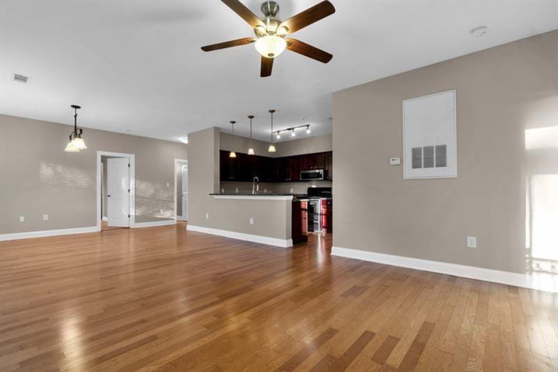 2230 Cheshire Bridge Road Northeast, Unit 412 Atlanta, GA 30324 - Photo 9 of 35 a view of an empty room with kitchen and window