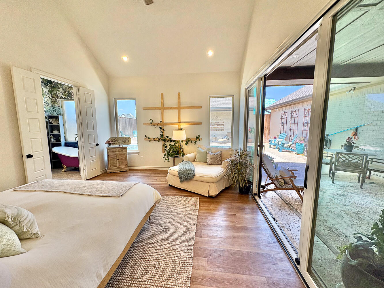5902 112th Street Lubbock, TX 79424 - Photo 13 of 45 a bedroom with furniture and a large window