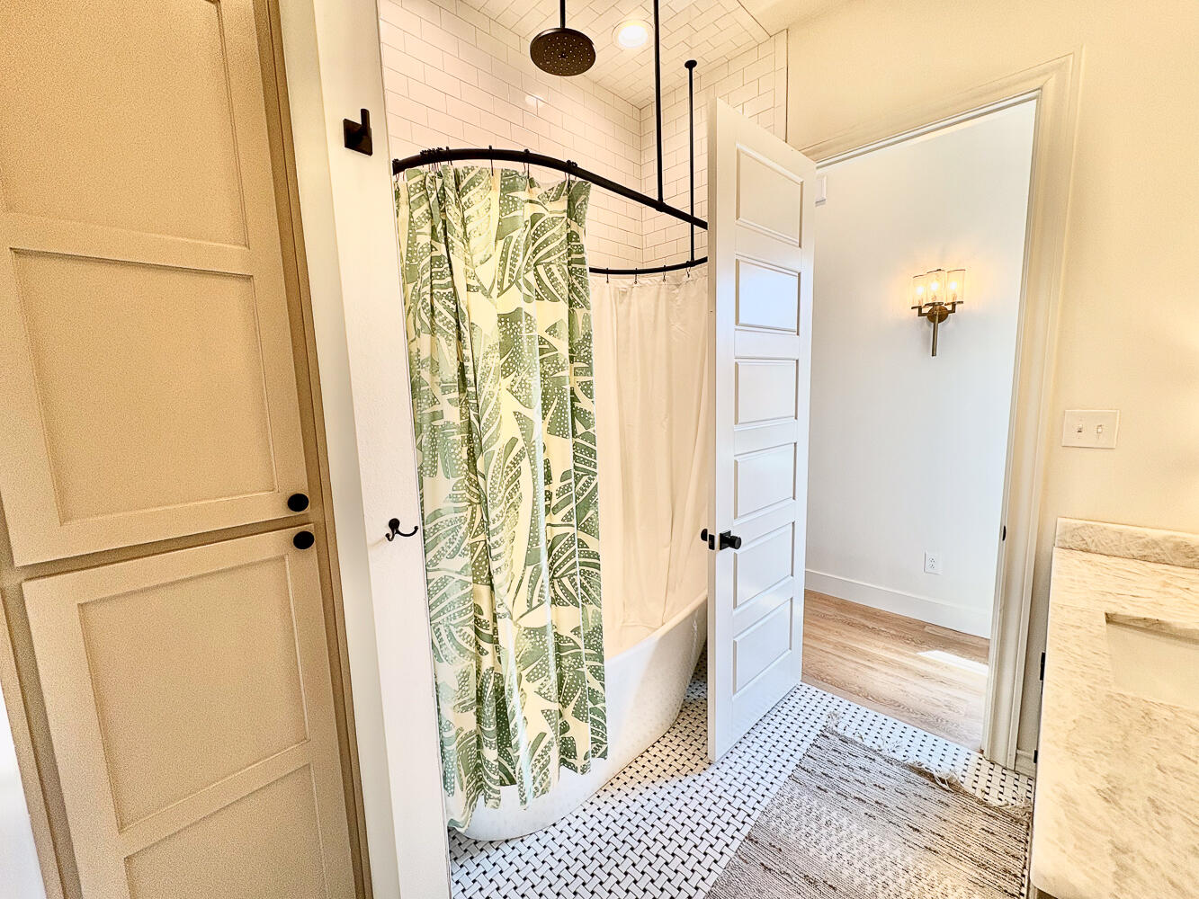 5902 112th Street Lubbock, TX 79424 - Photo 27 of 45 a bathroom with a tub and shower