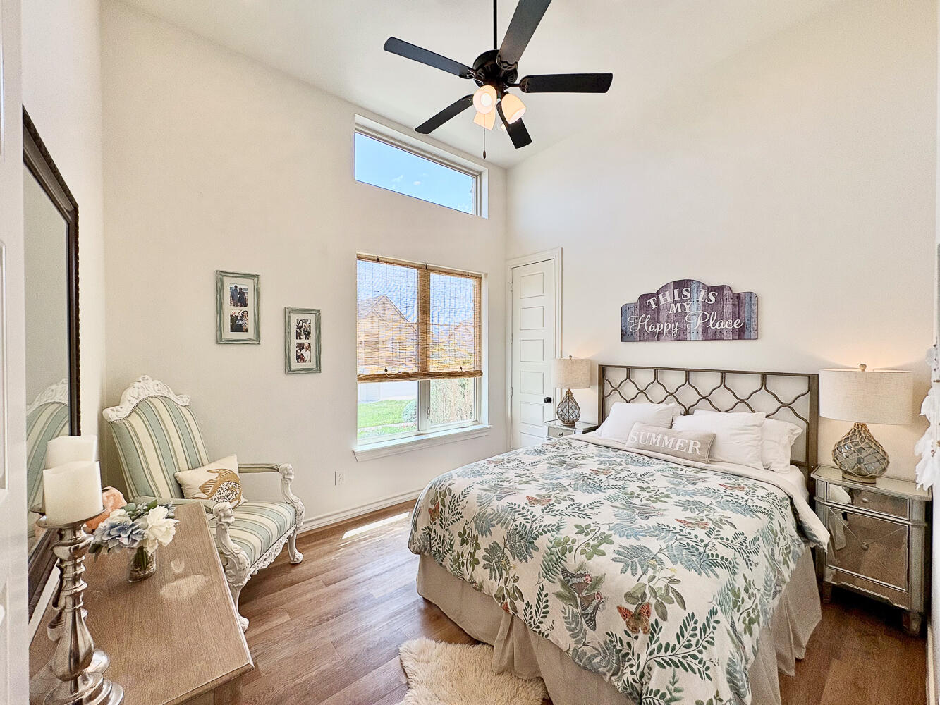 5902 112th Street Lubbock, TX 79424 - Photo 28 of 45 a bedroom with a bed and wooden floor