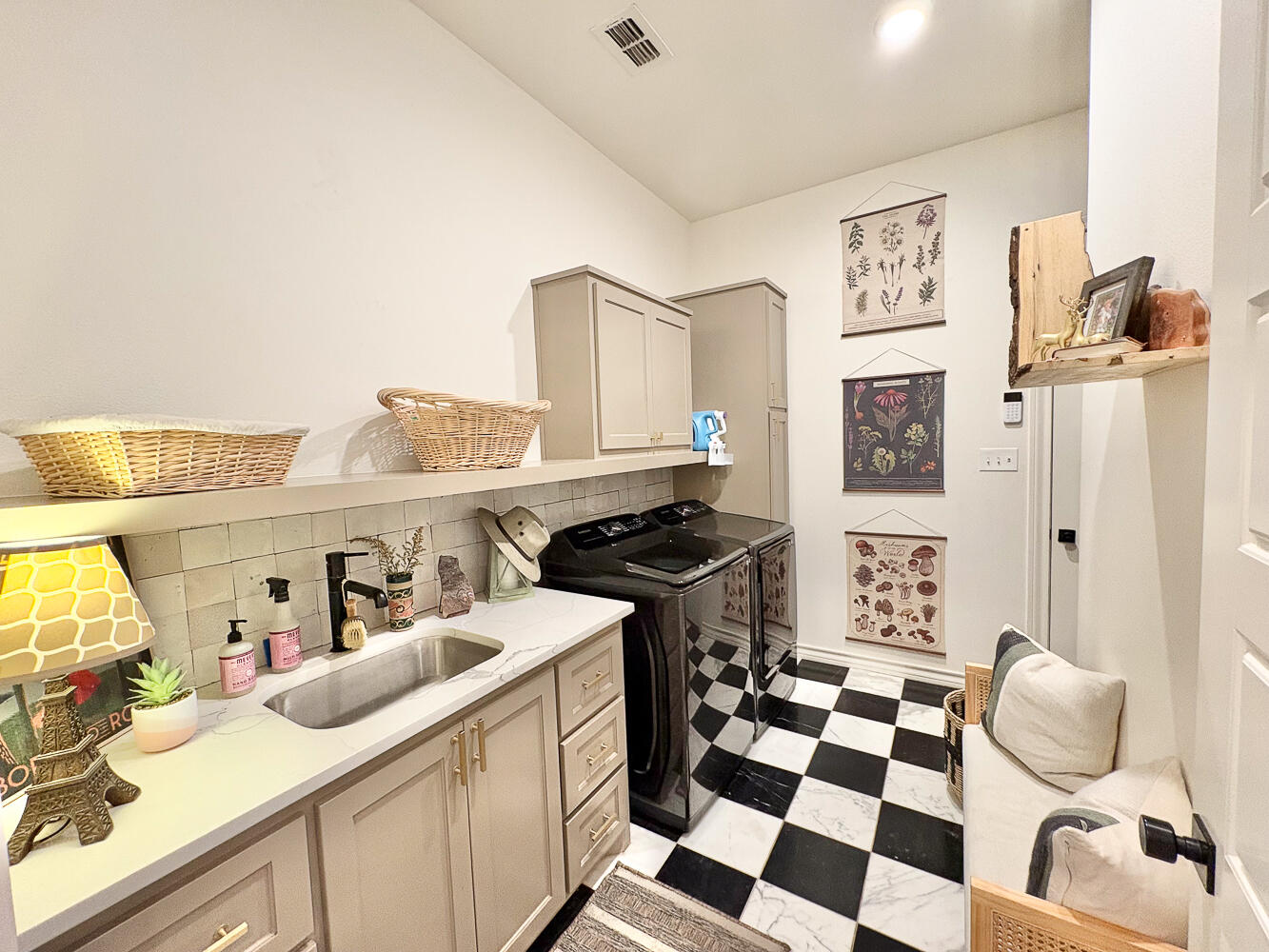 5902 112th Street Lubbock, TX 79424 - Photo 29 of 45 a kitchen with stainless steel appliances a stove a sink and a cabinets