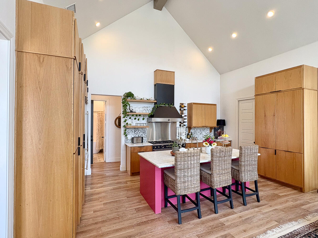 5902 112th Street Lubbock, TX 79424 - Photo 5 of 45 a view of a kitchen with dining room and wooden floor