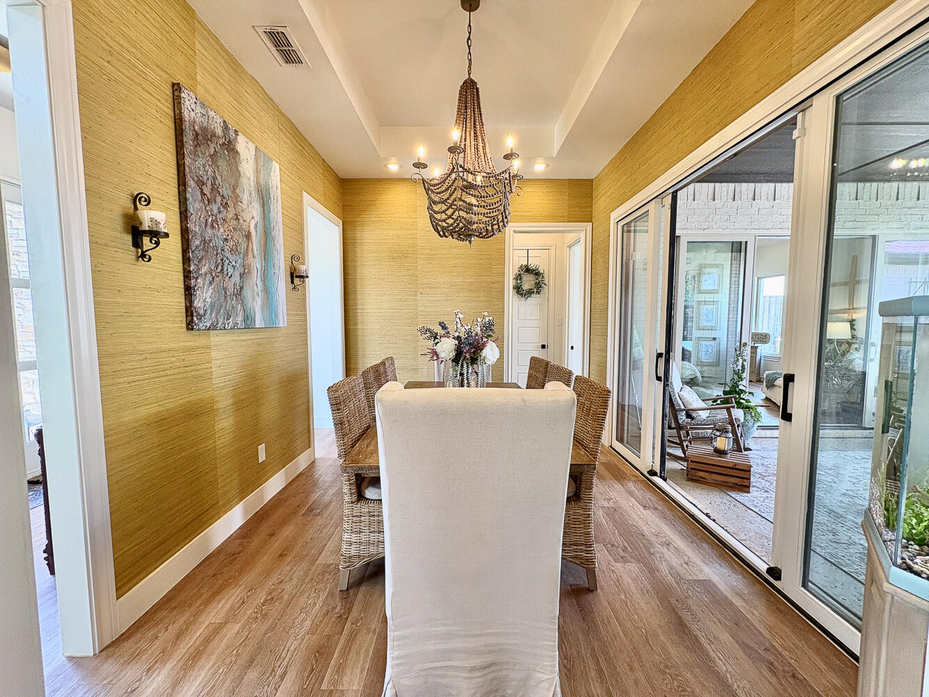 5902 112th Street Lubbock, TX 79424 - Photo 9 of 45 a dining room with wooden floor and furniture