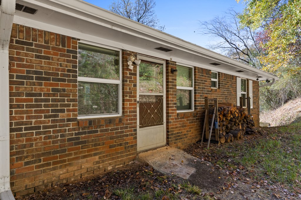 492 Johnny Gap Road Suches, GA 30572 - Photo 15 of 16 a view of a porch with a wooden fence