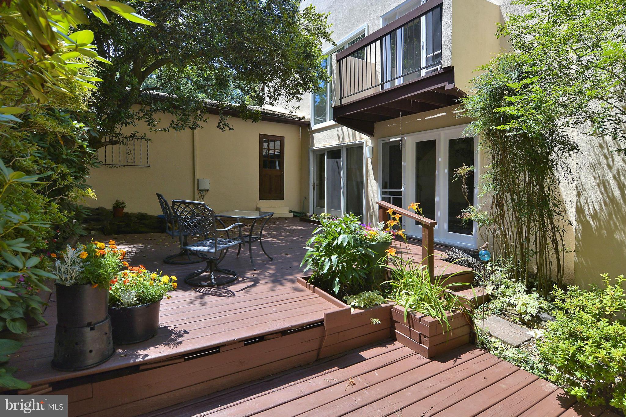 11652 Mediterranean Court Reston, VA 20190 - Photo 23 of 30 Large private side deck w/waterfall pond