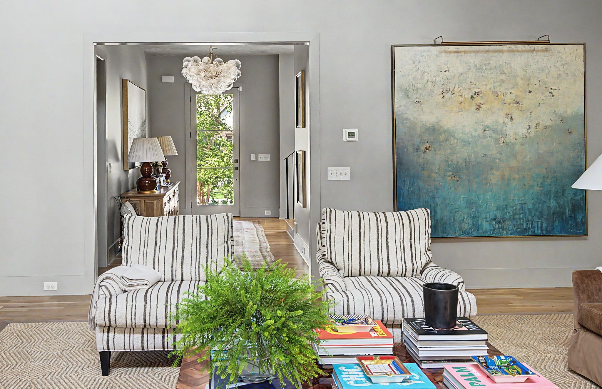 2825 Sugar Tree Road Nashville, TN 37215 - Photo 22 of 89 a bedroom with a bed and a painting on the wall
