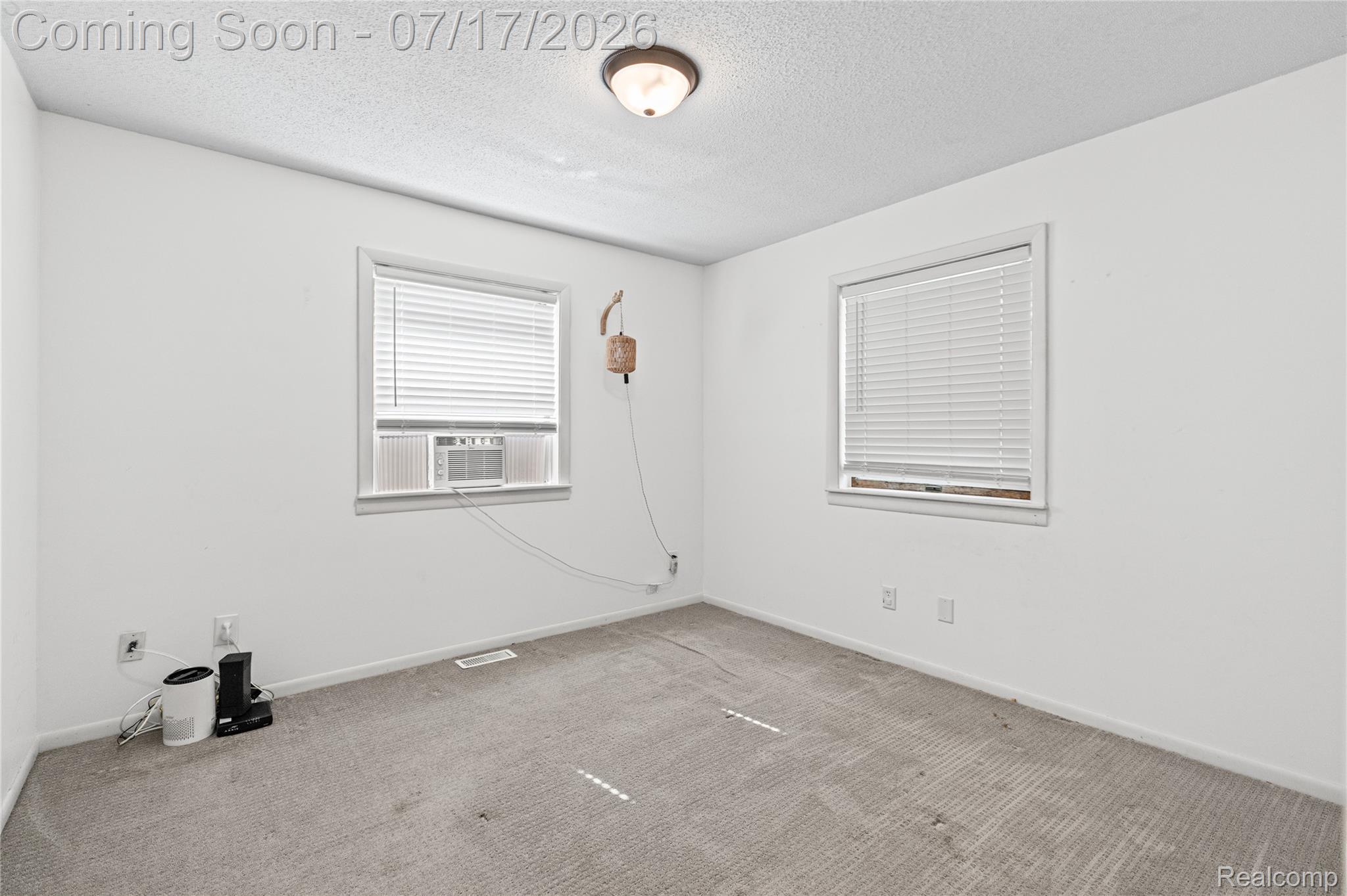 9204 Bray Road Millington, MI 48746 - Photo 5 of 14 Neutral wall paint with textured ceiling