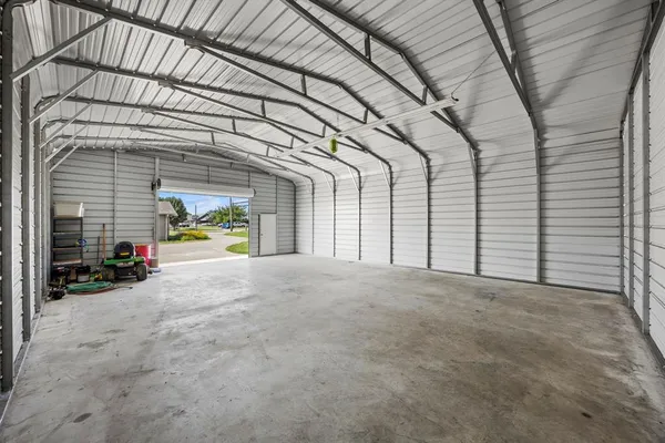 a view of garage and front door