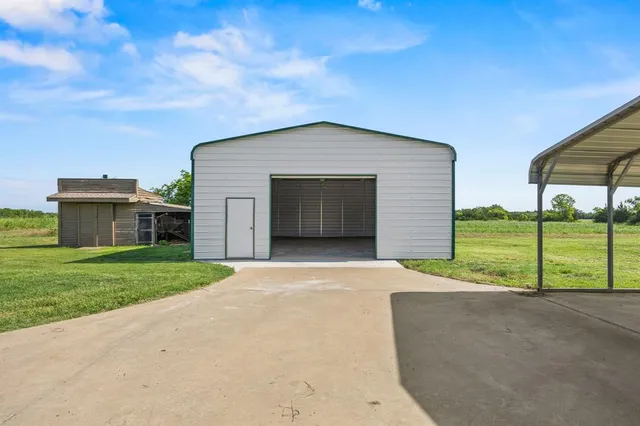 a front view of a house with garage