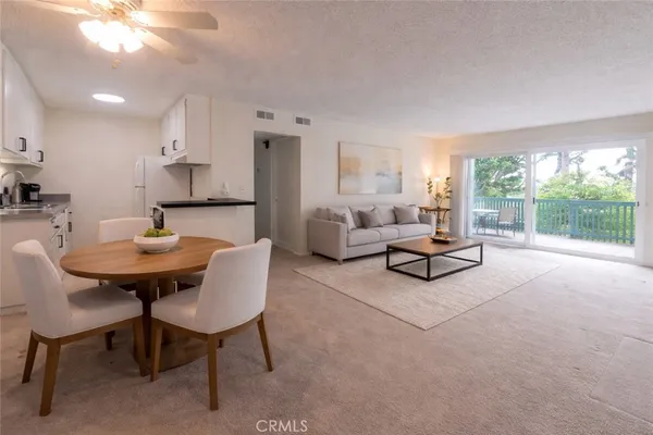 a living room with furniture and a table