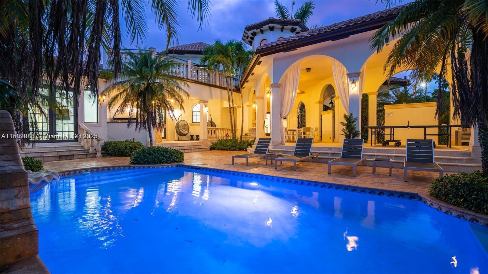 a swimming pool with outdoor seating yard and patio