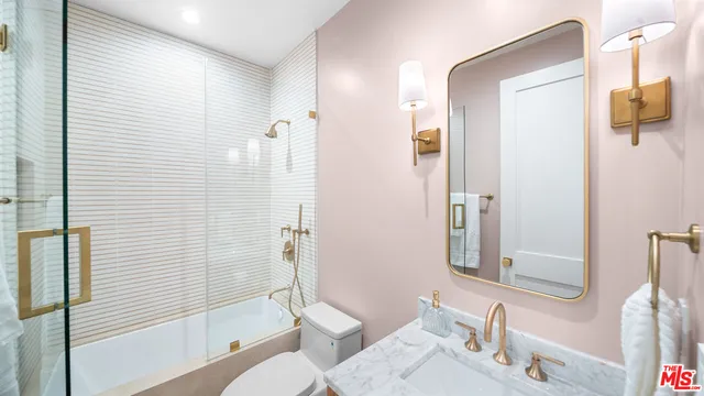 a bathroom with a sink and toilet