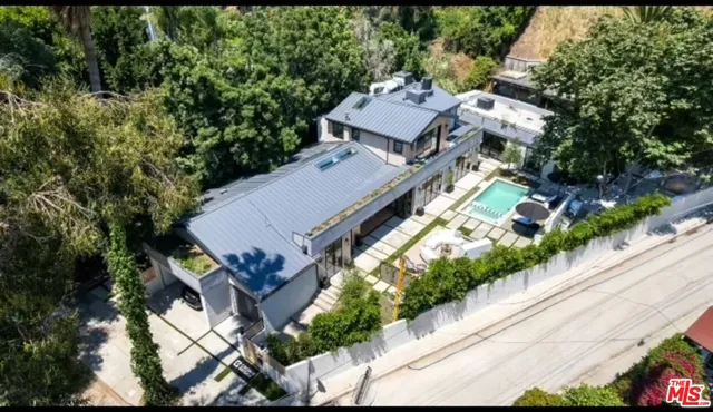 an aerial view of an buildings and street
