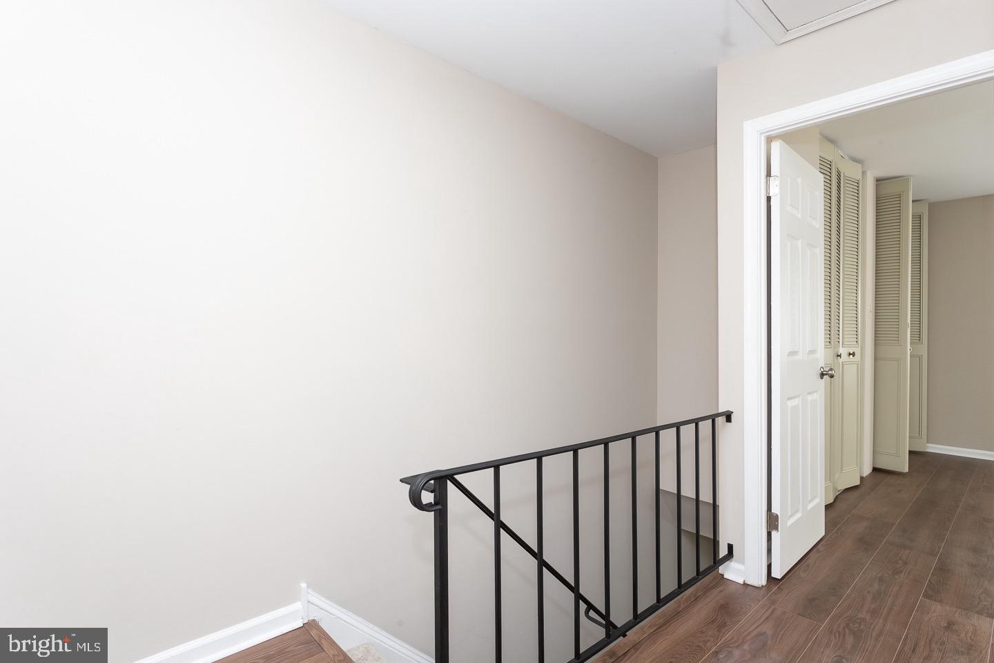 118 Caernarvon Court Exton, PA 19341 - Photo 20 of 36 a view of a hallway with wooden floor