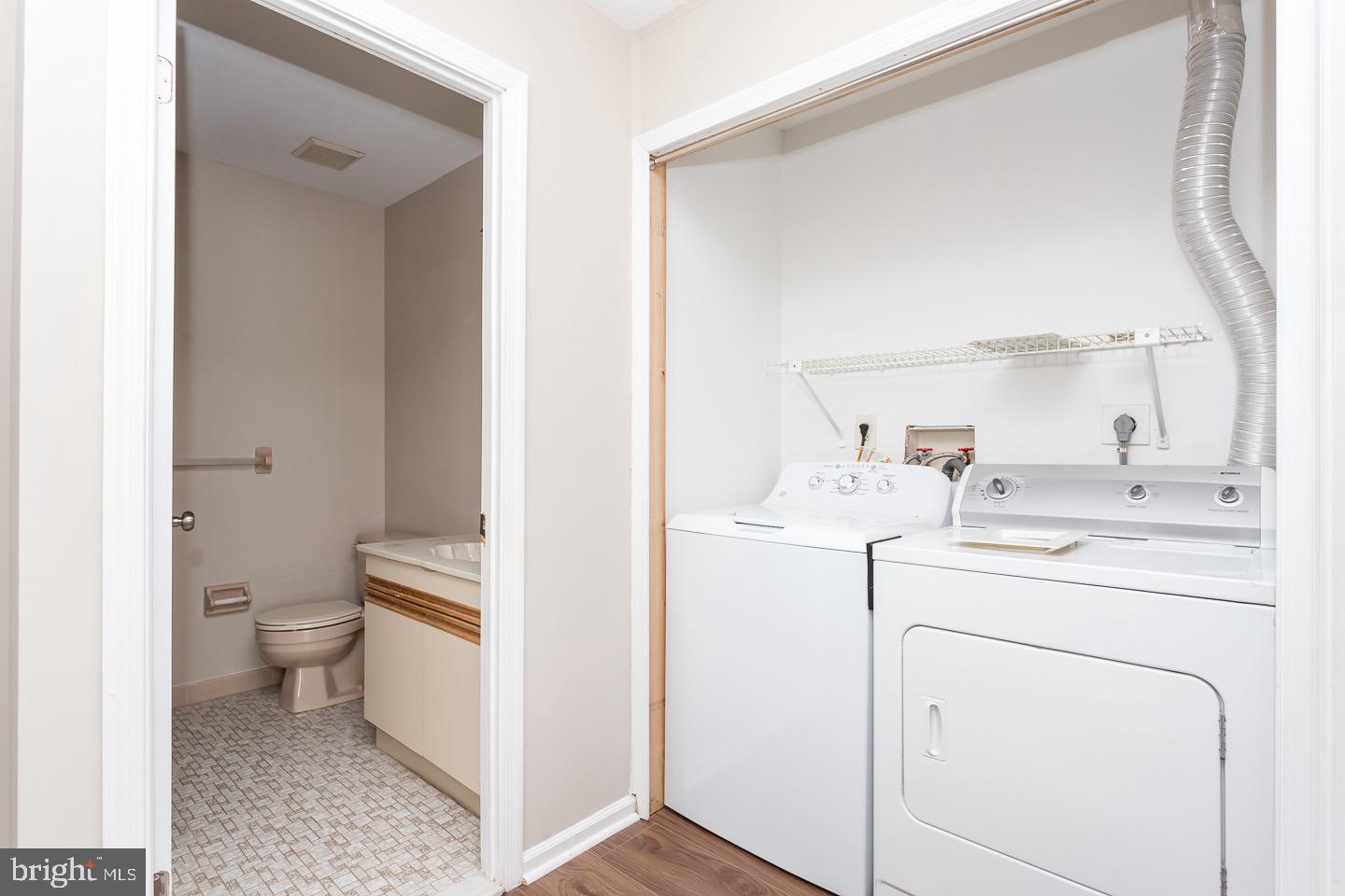 118 Caernarvon Court Exton, PA 19341 - Photo 21 of 36 a bathroom with a toilet sink and a mirror