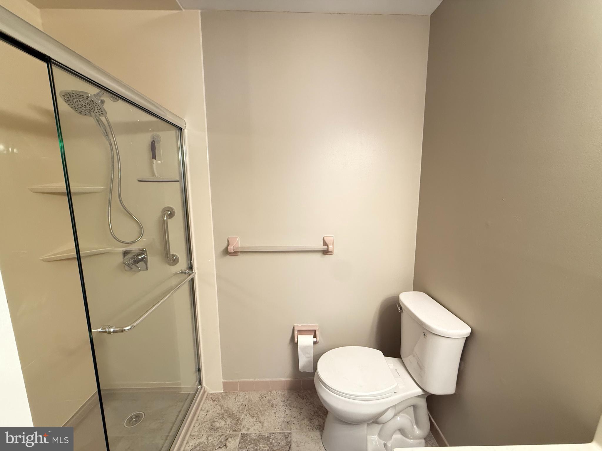 118 Caernarvon Court Exton, PA 19341 - Photo 22 of 36 a white toilet sitting next to a bathroom sink