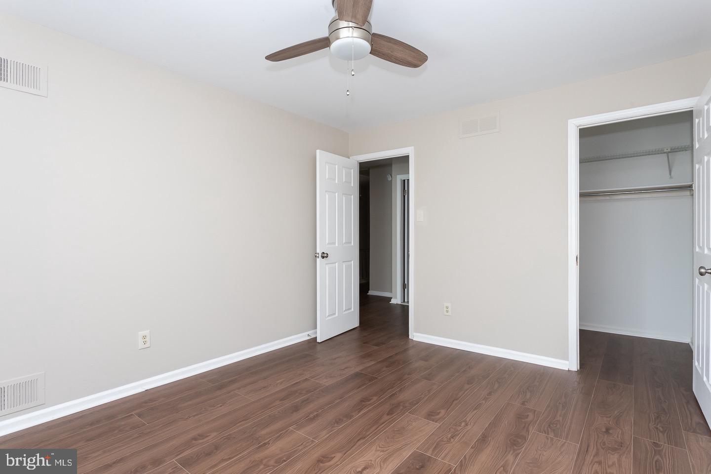 118 Caernarvon Court Exton, PA 19341 - Photo 25 of 36 a view of an empty room with wooden floor