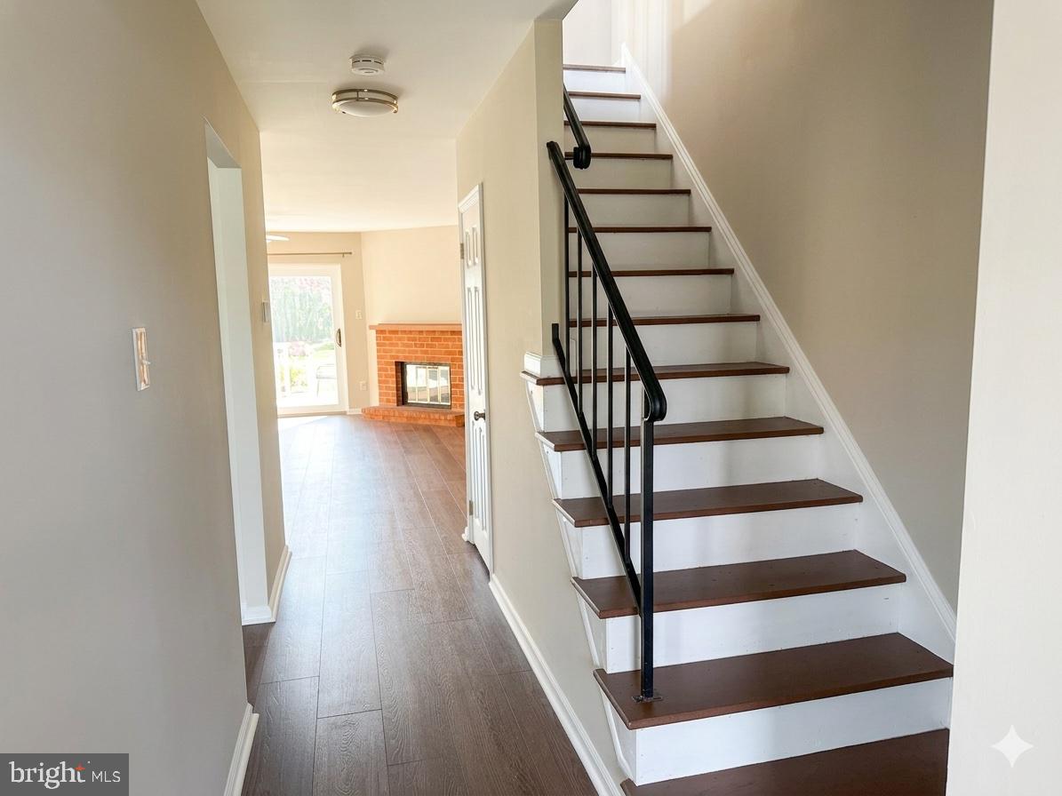 118 Caernarvon Court Exton, PA 19341 - Photo 5 of 36 a view of entryway and hall with wooden floor