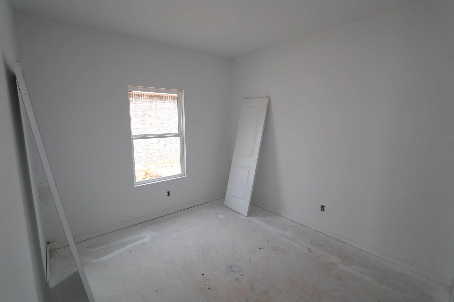 7815 Jade Crest Drive Angleton, TX 77515 - Photo 8 of 38 an empty room with a window