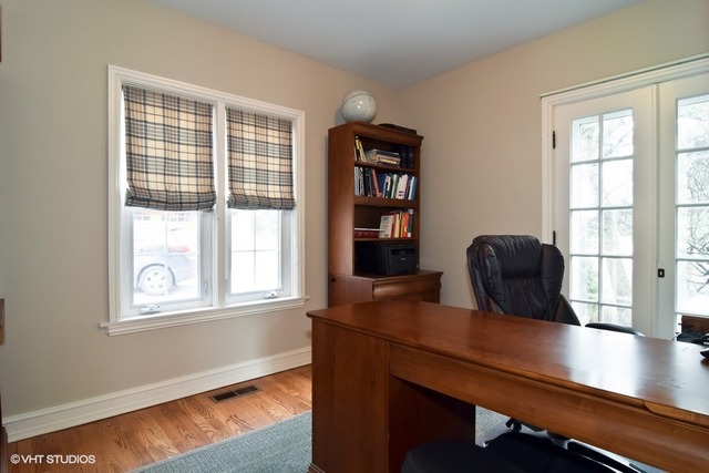 5600 South County Line Road Hinsdale, IL 60521 - Photo 11 of 24 a view of a workspace with furniture and a window