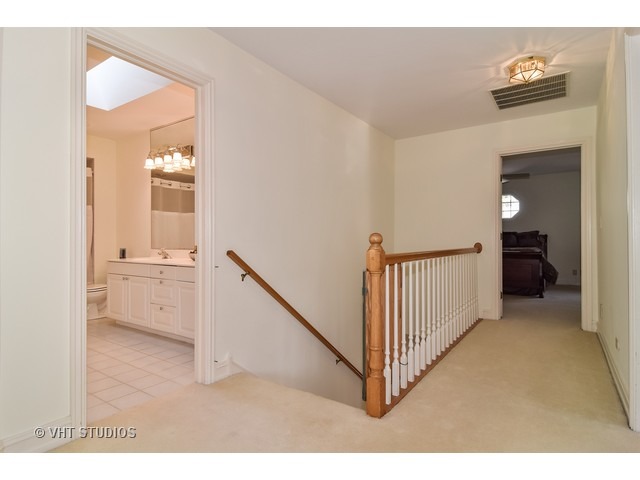 5600 South County Line Road Hinsdale, IL 60521 - Photo 14 of 24 a view of a hallway with staircase