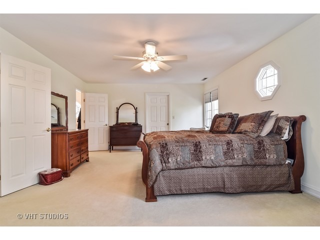 5600 South County Line Road Hinsdale, IL 60521 - Photo 15 of 24 a living room with furniture a mirror and a window