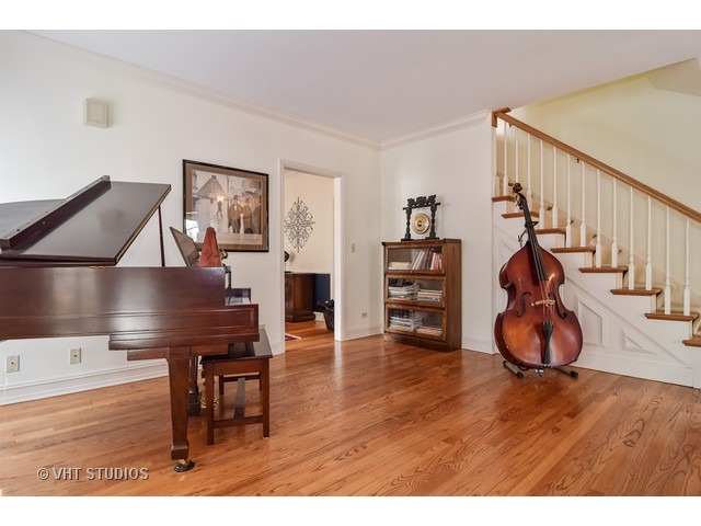 5600 South County Line Road Hinsdale, IL 60521 - Photo 5 of 24 a view of a livingroom with furniture and wooden floor
