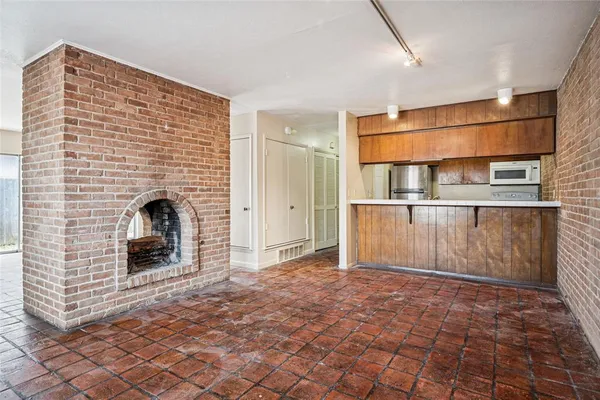 a bathroom with a sink a stove and washer