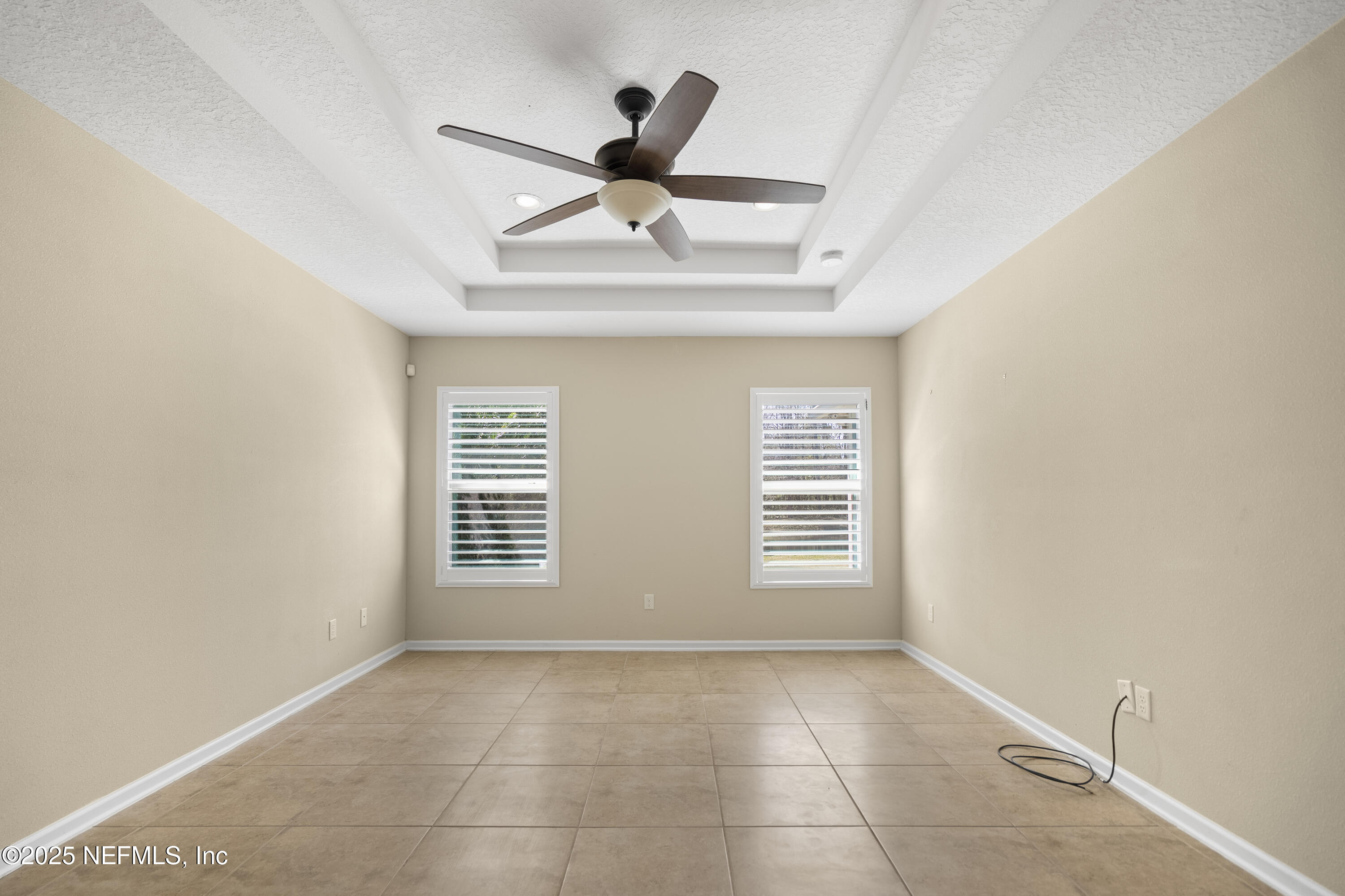 230 Timberwood Drive St. Augustine, FL 32084 - Photo 20 of 34 a view of an empty room with a window