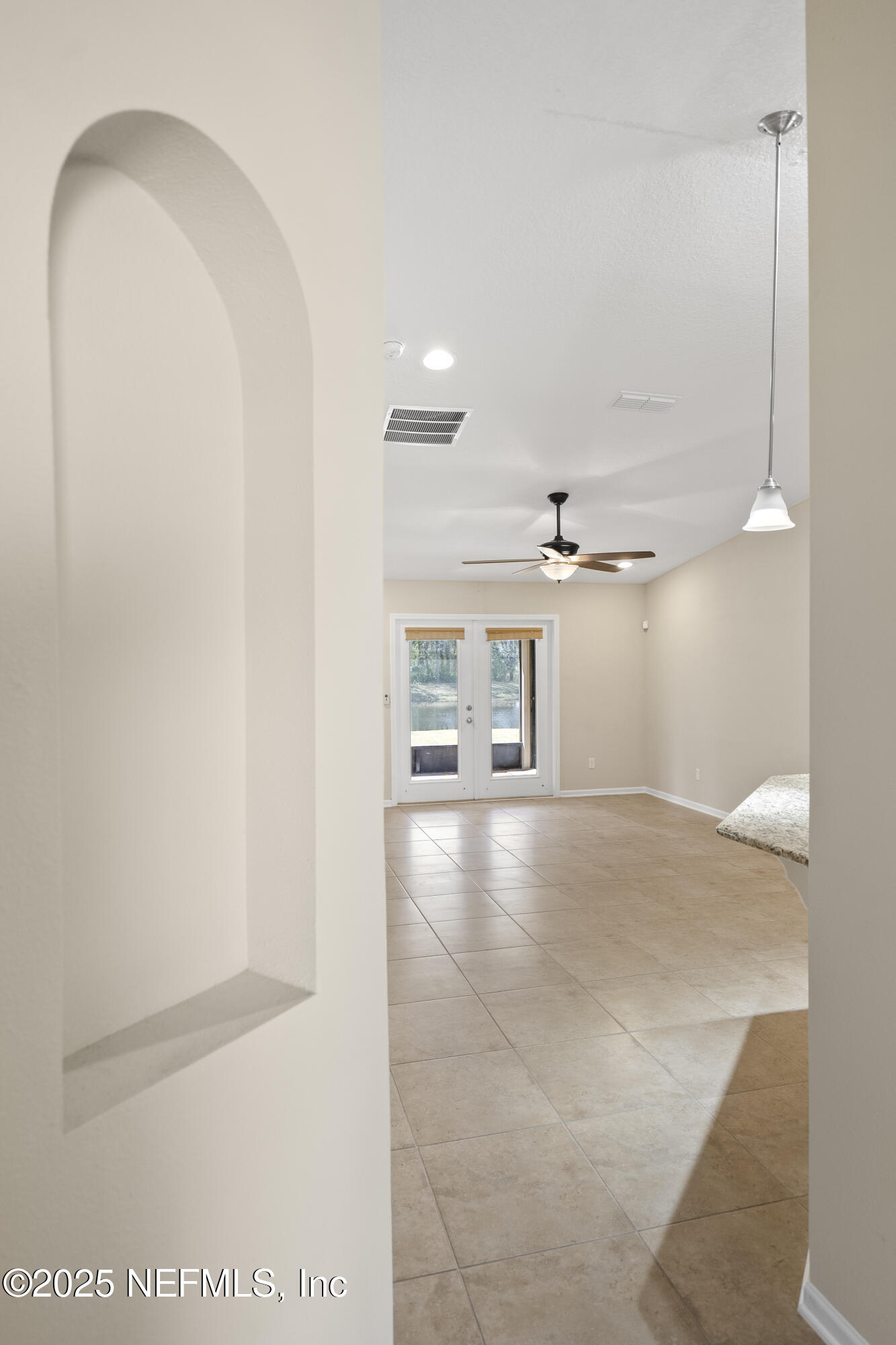 230 Timberwood Drive St. Augustine, FL 32084 - Photo 23 of 34 a view of a livingroom with a furniture and a ceiling fan