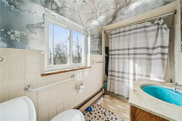 a bathroom with a sink and a bathtub