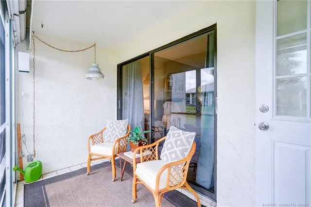 a view of building with yard street and trees