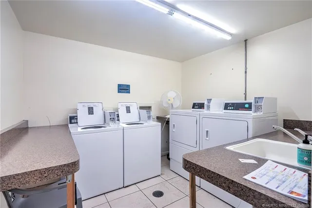 a bathroom with a sink vanity and a mirror