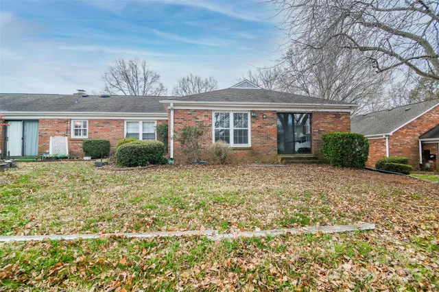front view of a house with a garden