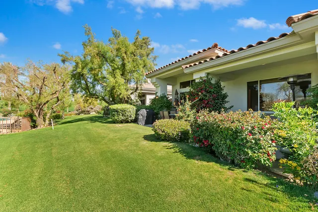 a view of a house with a garden