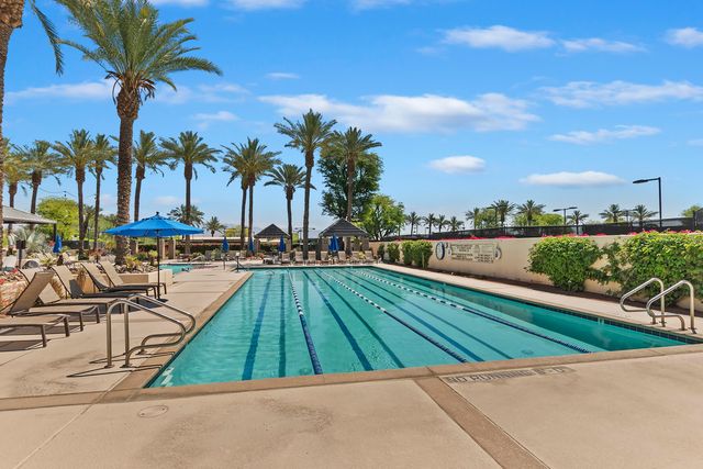a view of a house with a tree