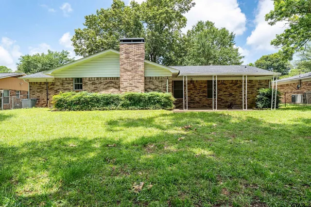 a house view with a garden space