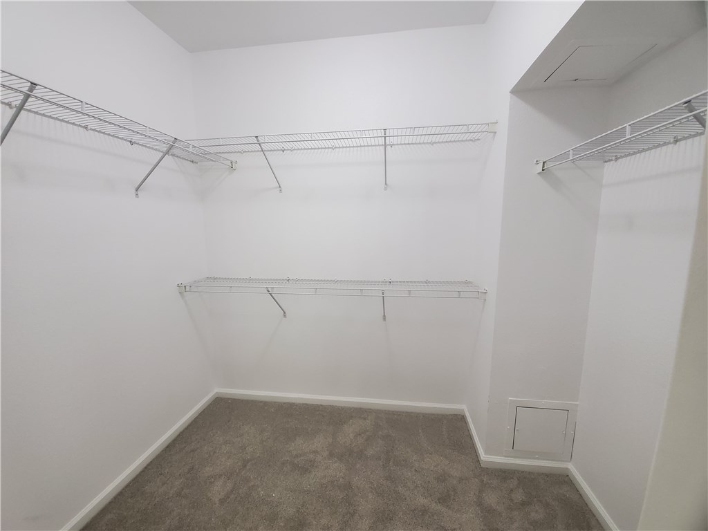 11203 Ranch Road 2222, Unit 302 Austin, TX 78732 - Photo 13 of 18 Large walk in master bedroom closet