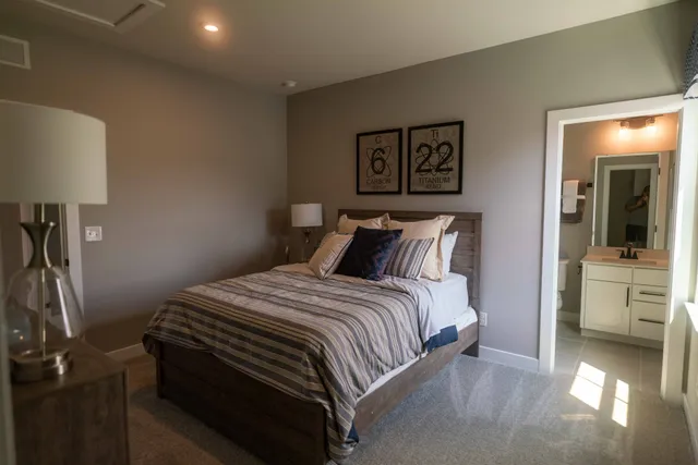 a bathroom with a sink a toilet and tub