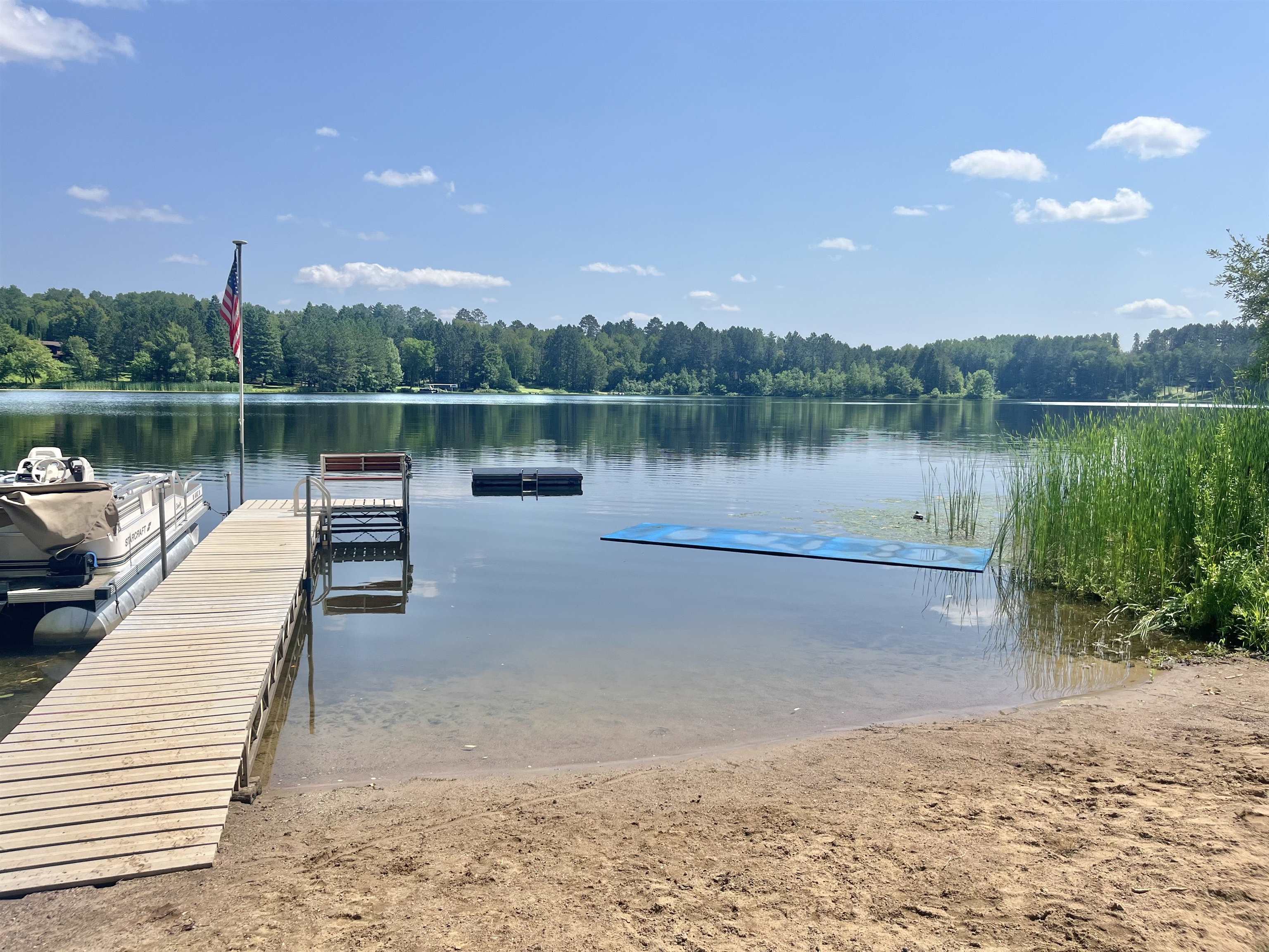 4381 Lilac Road Gilbert, MN 55741 - Photo 44 of 56 Dock area featuring a water view and a view of trees
